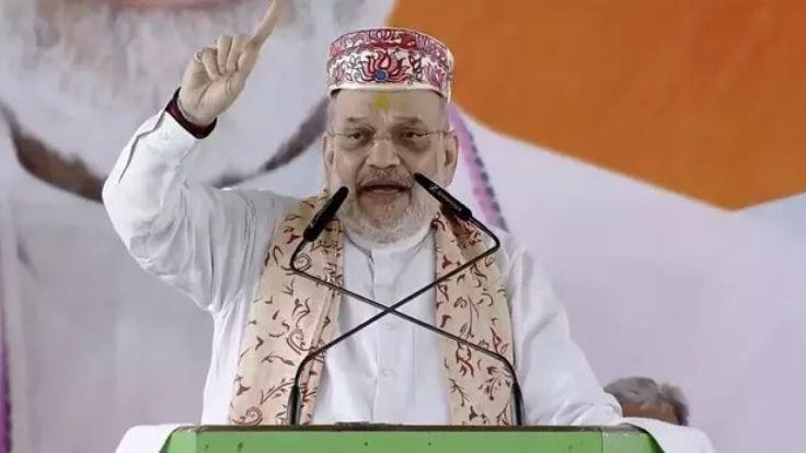 धारा 370 को 70 साल से बचा कर बैठी थी लालू एंड कंपनी, दरभंगा में अमित शाह ने आरजेडी-कांग्रेस पर किये हमले